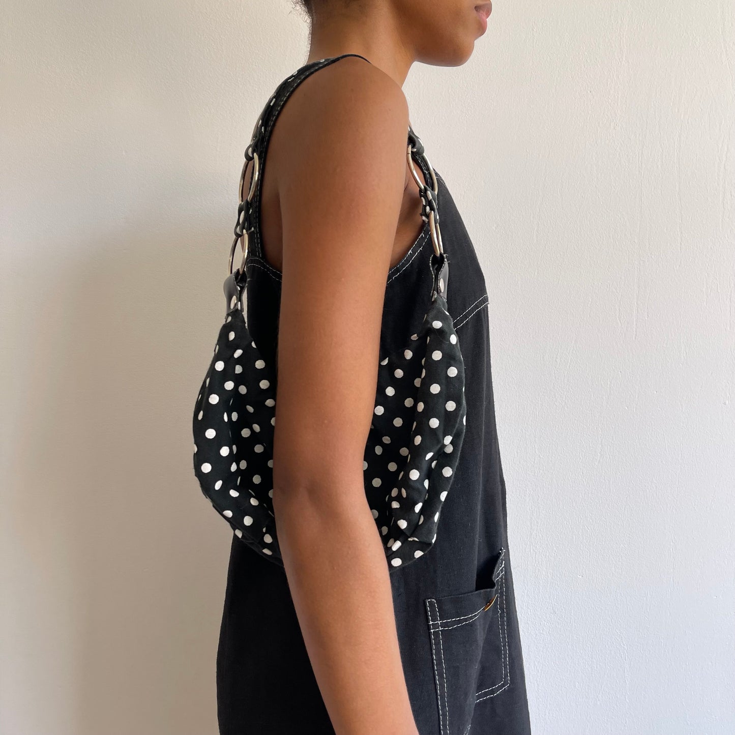 Black polka dot mini bag