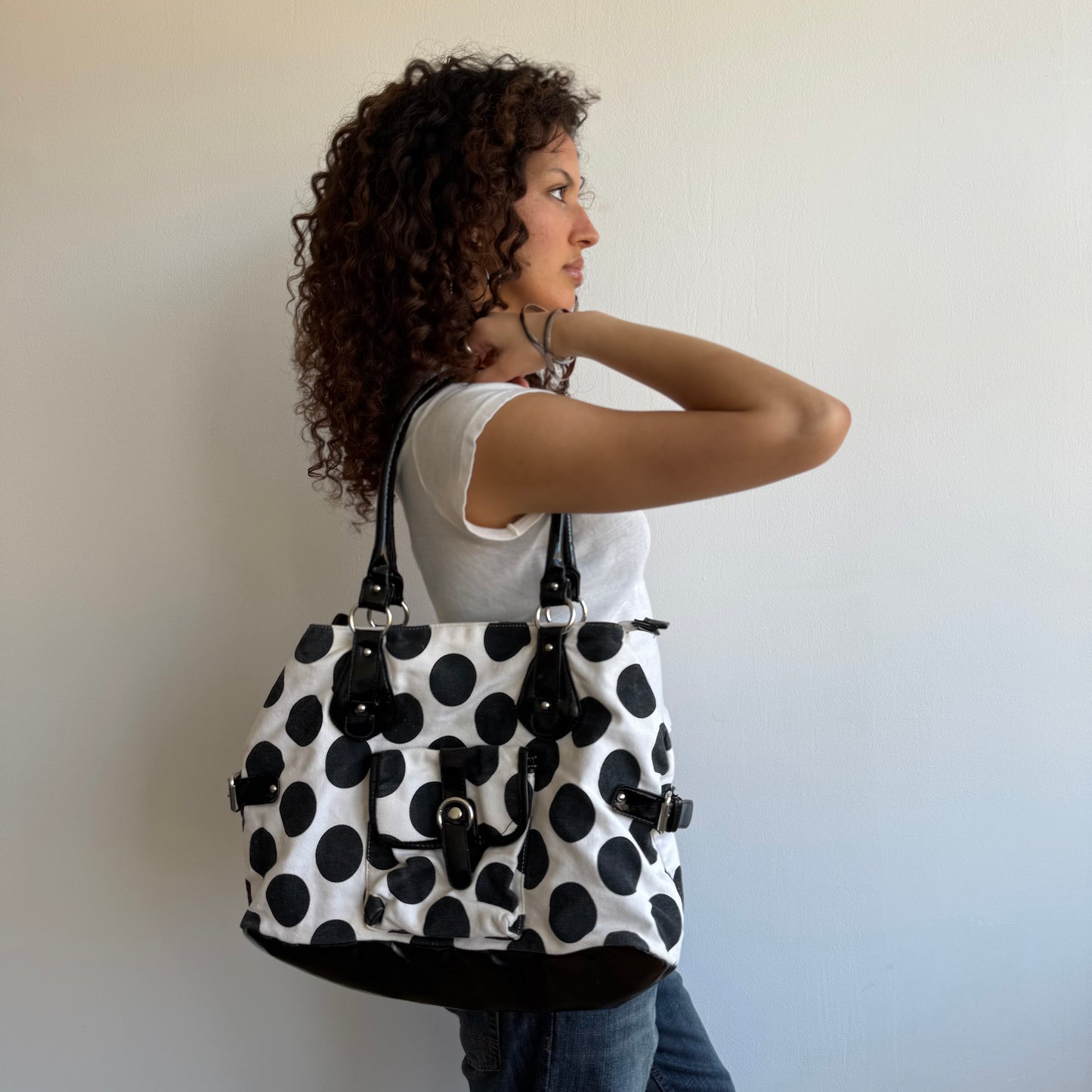 White polka dot bag