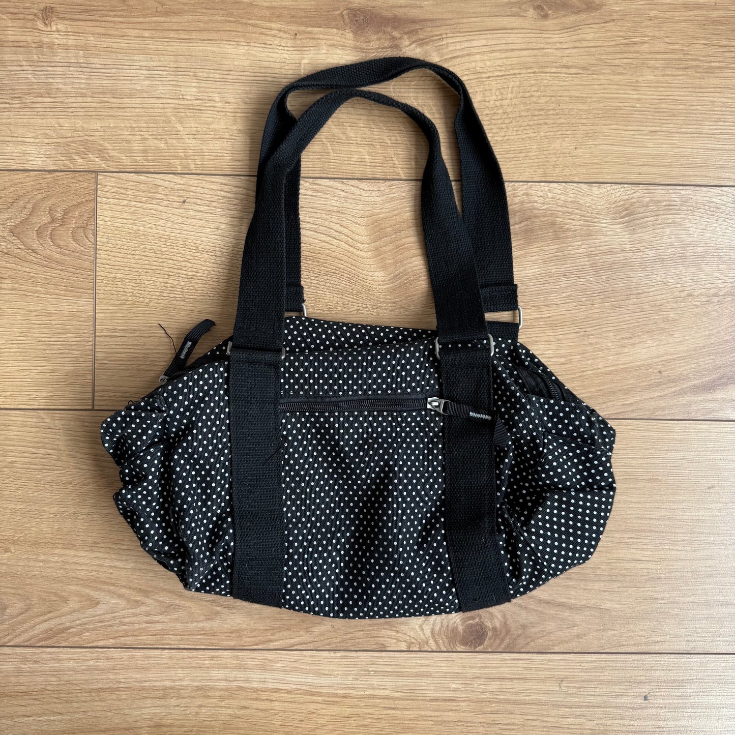 Black polka dot bowling bag