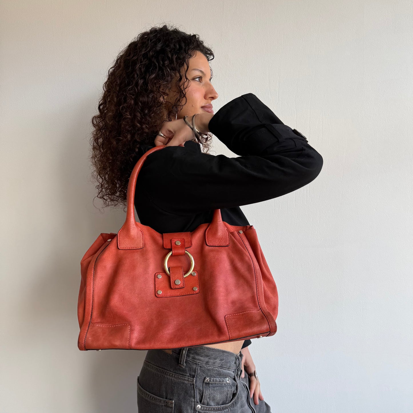 Orange leather slouchy bag