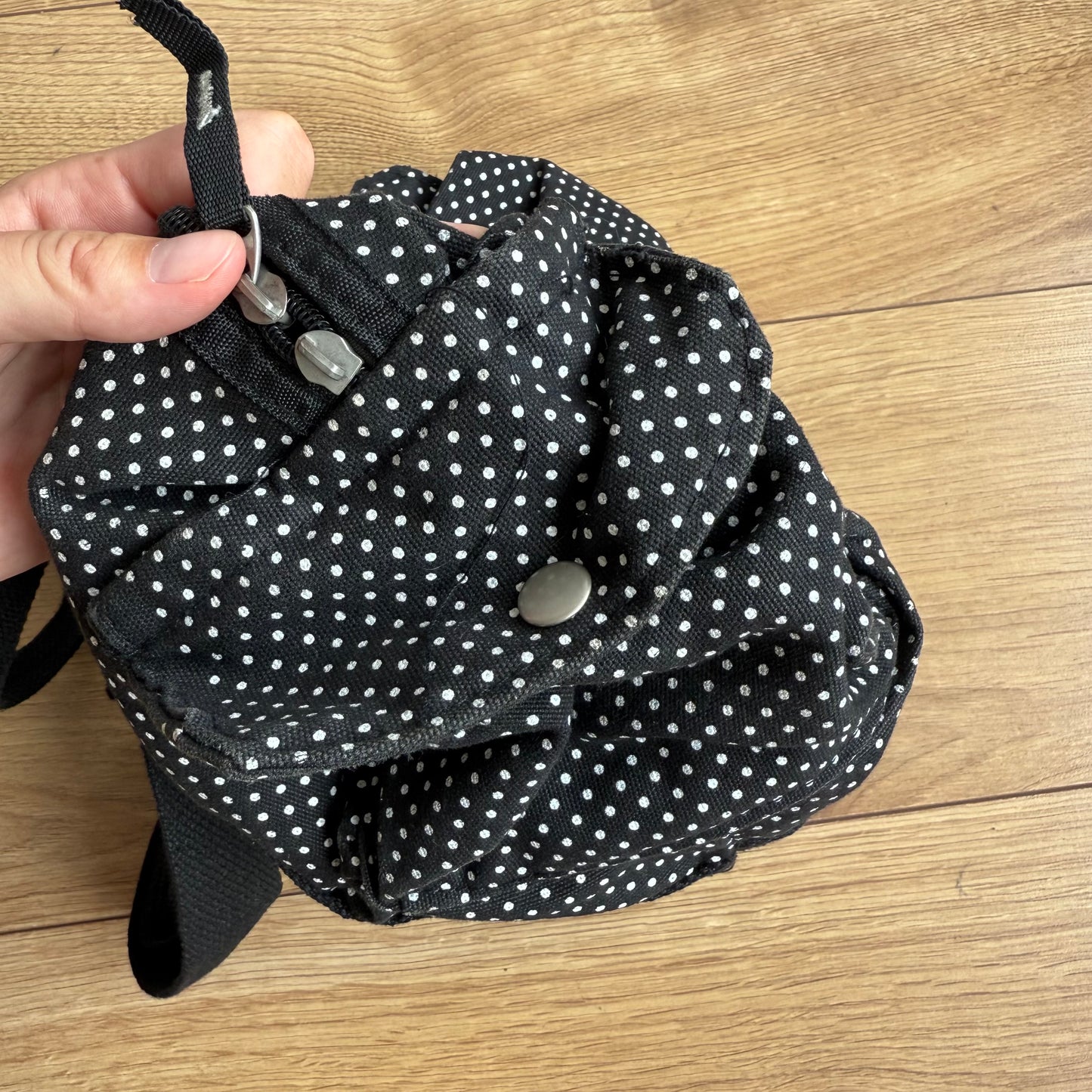 Black polka dot bowling bag