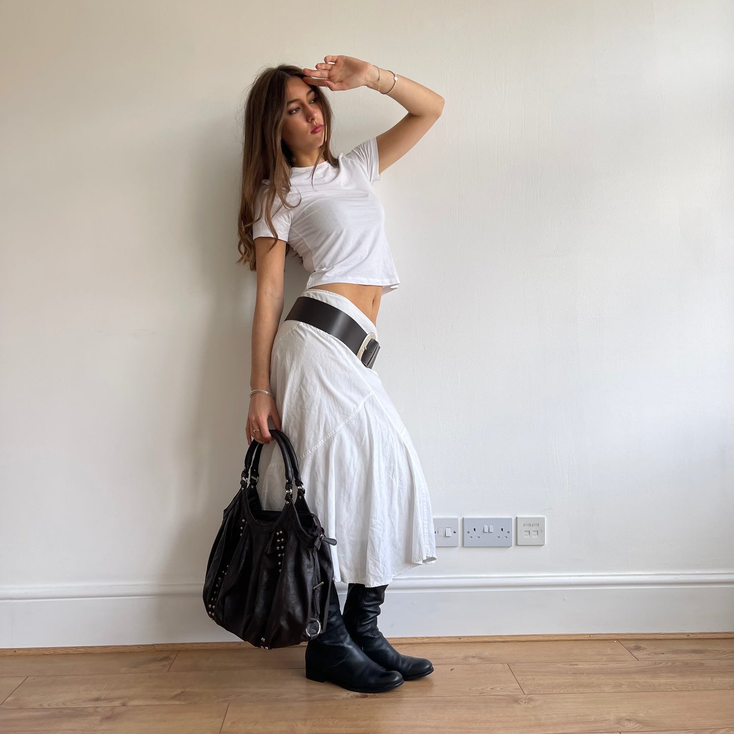 Brown studded slouchy bag