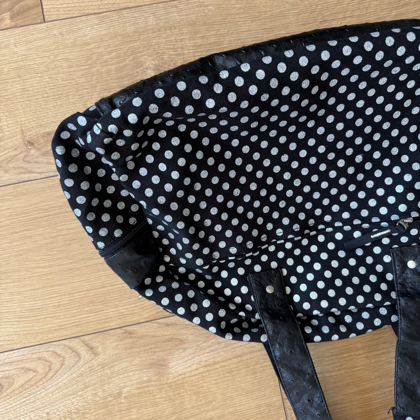 Black polka dot bowling bag