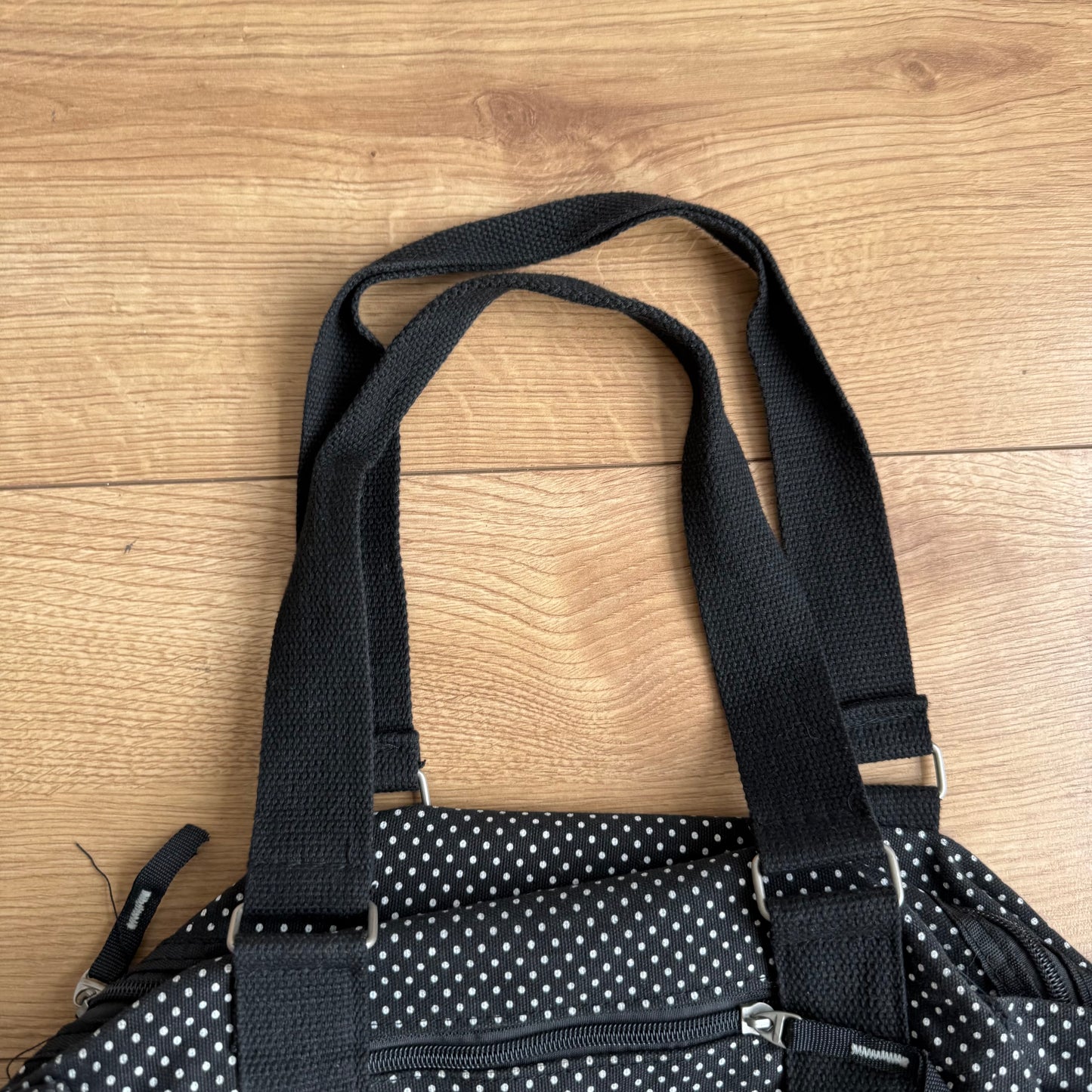 Black polka dot bowling bag
