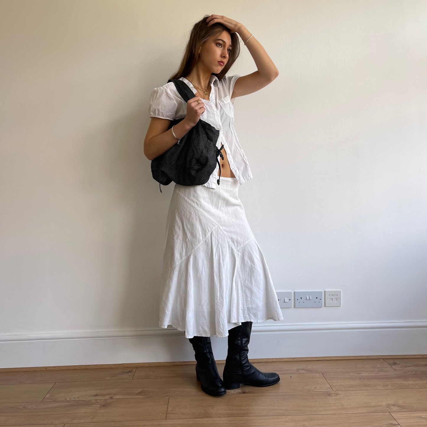 Black drawstring polka dot bag