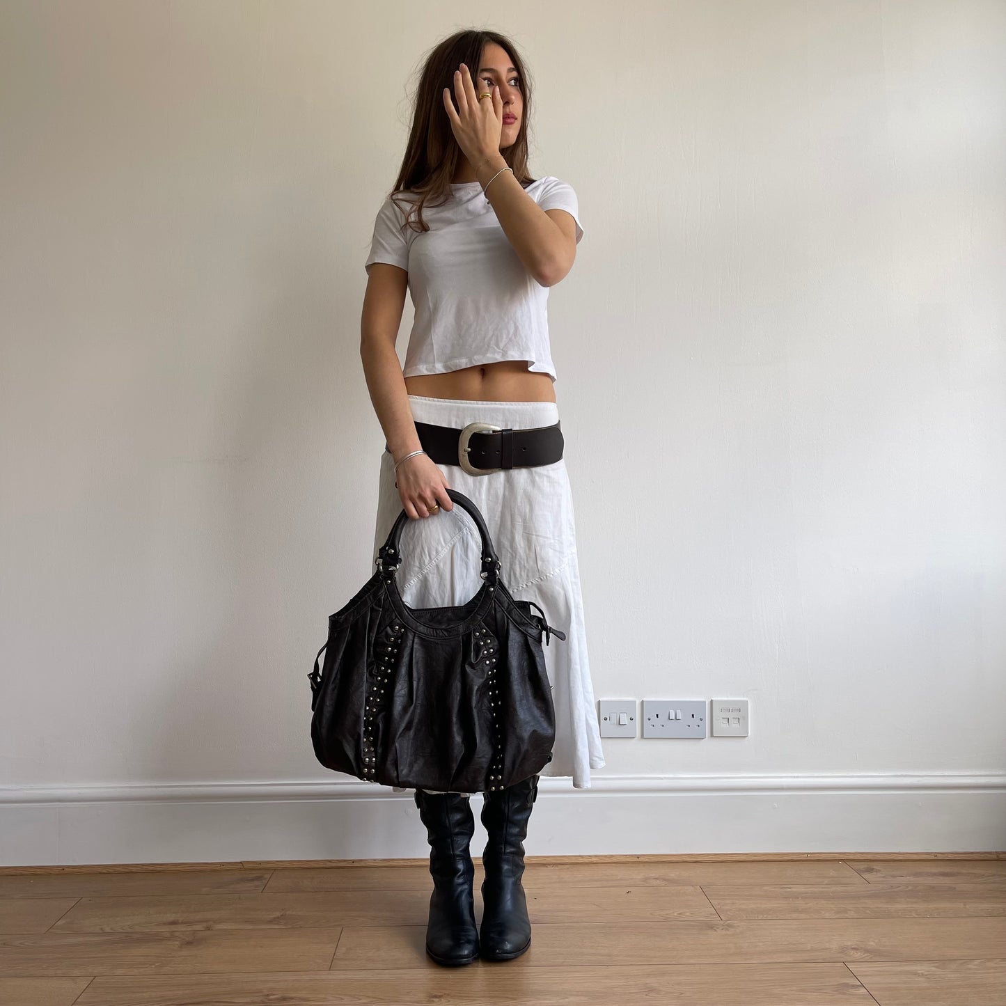 Brown studded slouchy bag