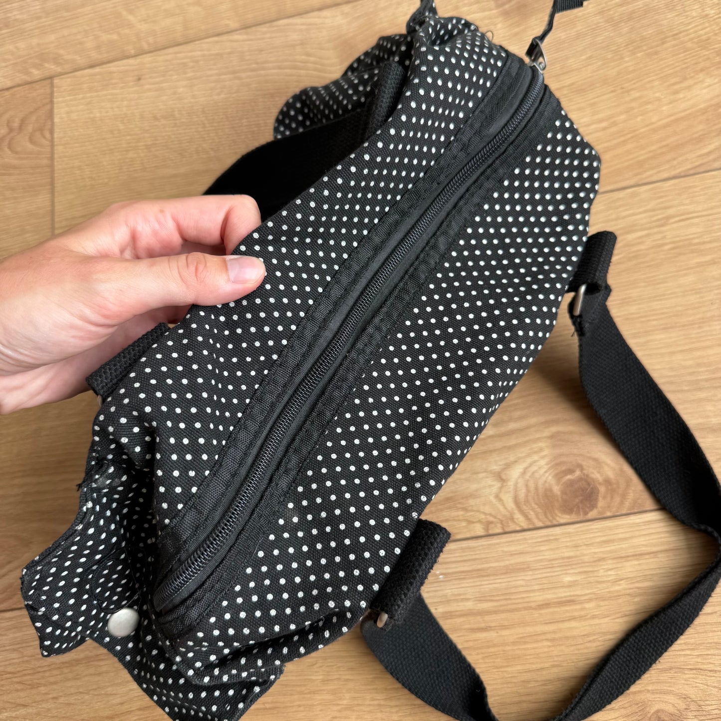 Black polka dot bowling bag