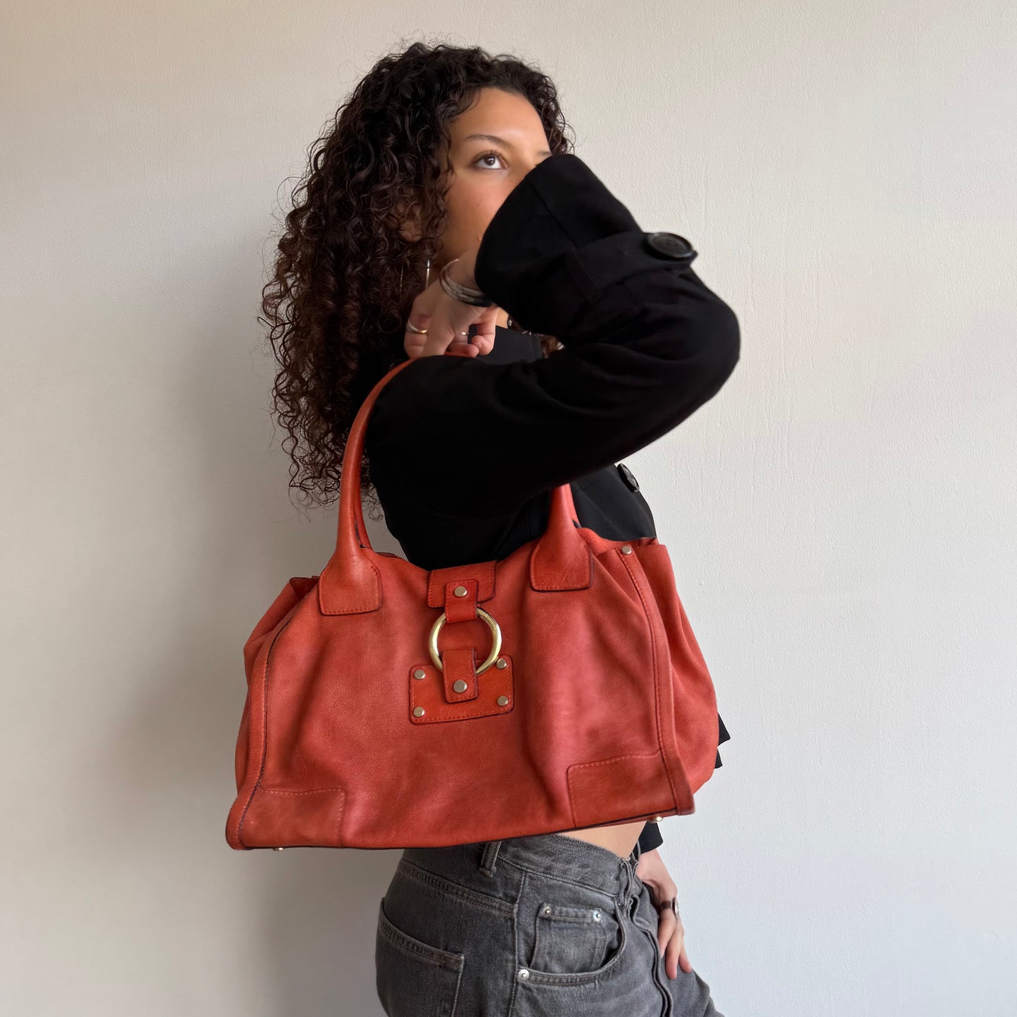Orange leather slouchy bag