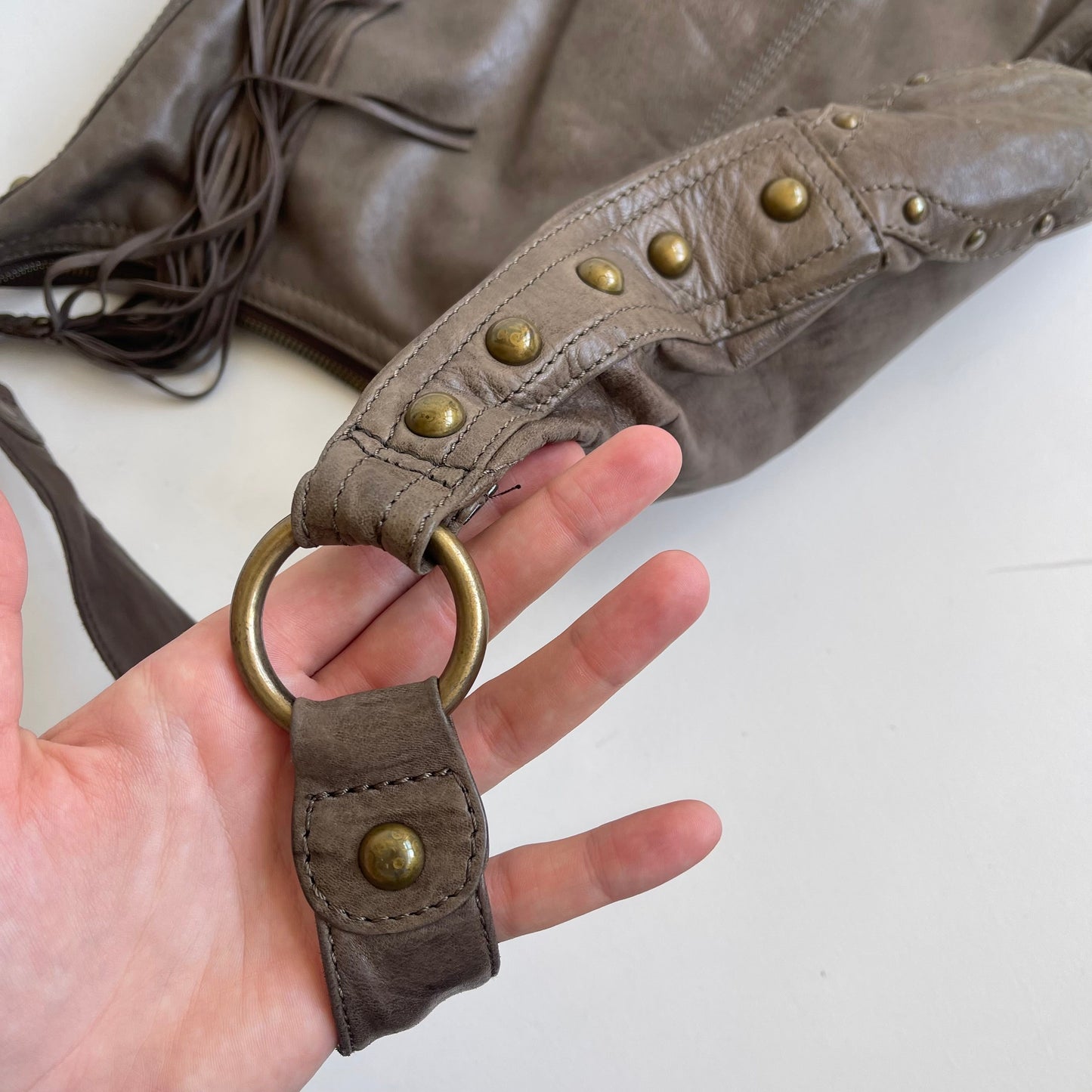 Brown leather tassle bag