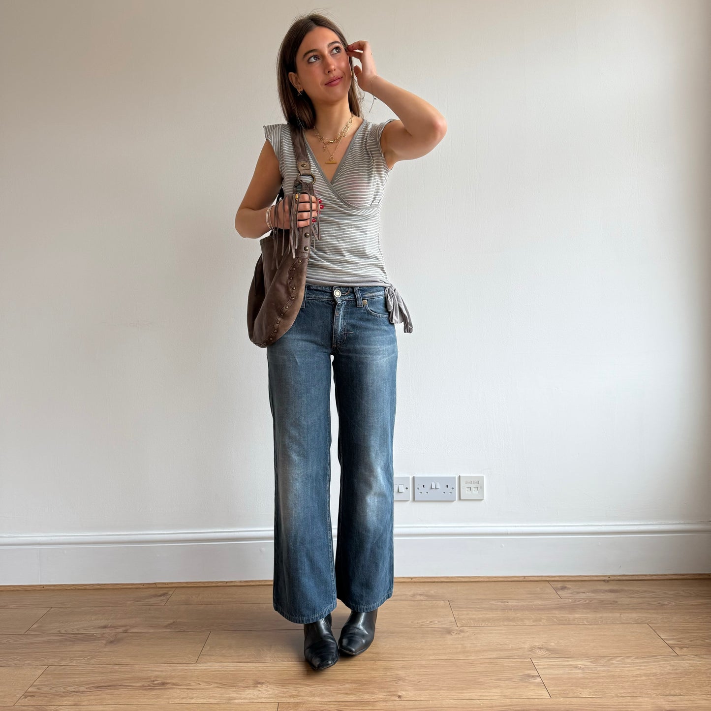 Brown leather tassle bag