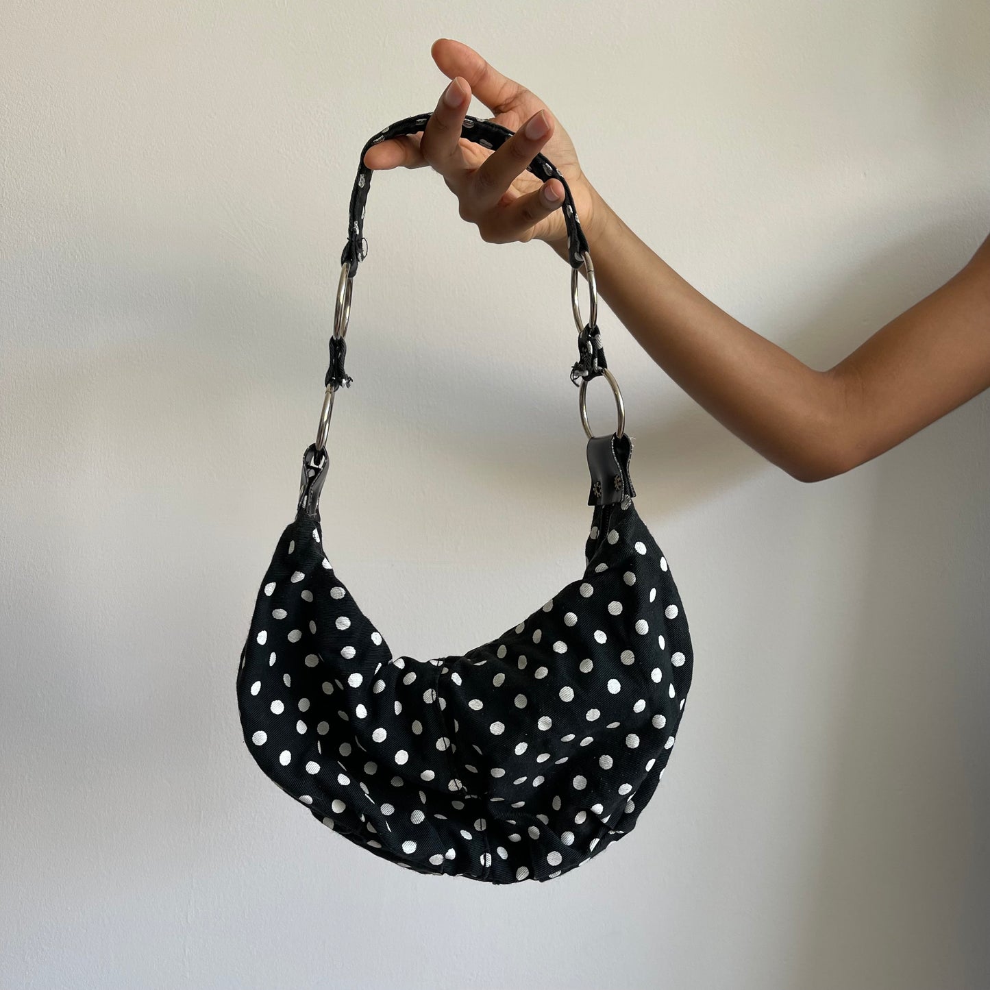 Black polka dot mini bag