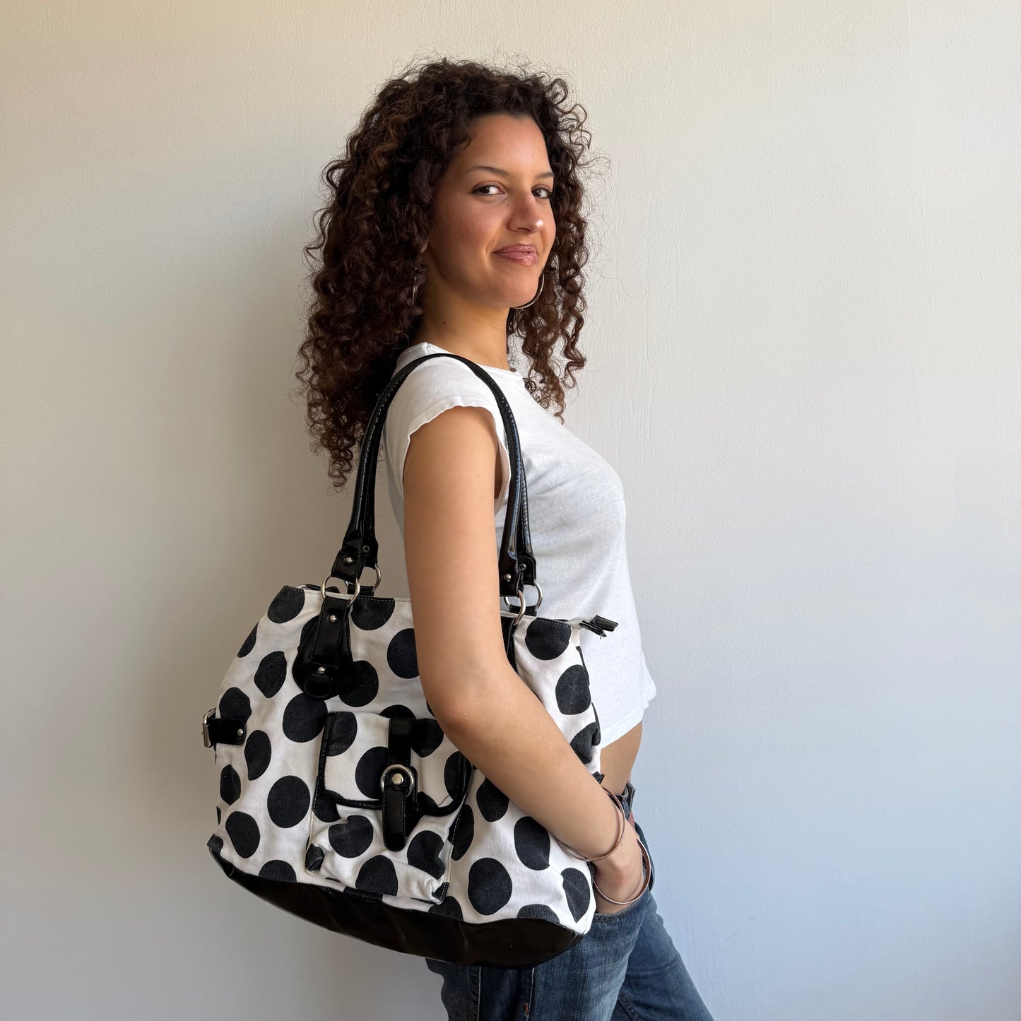 White polka dot bag