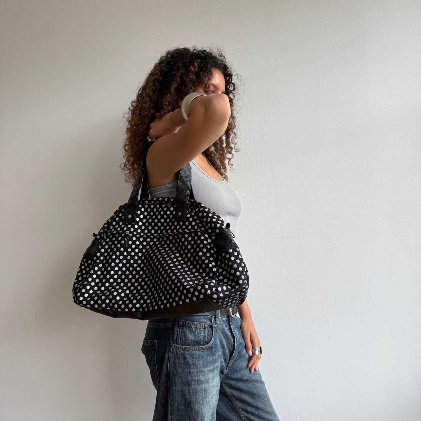 Black polka dot bowling bag