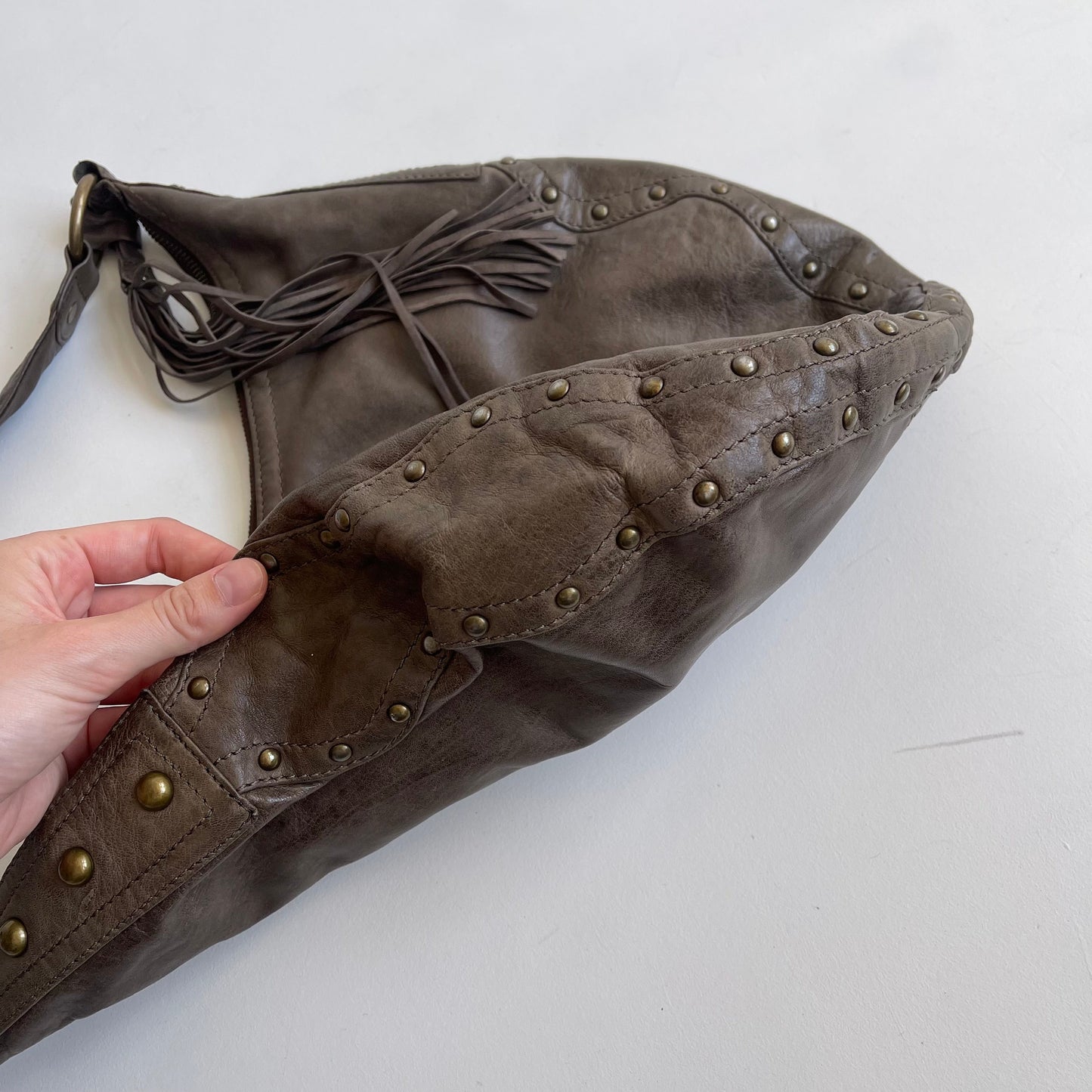 Brown leather tassle bag