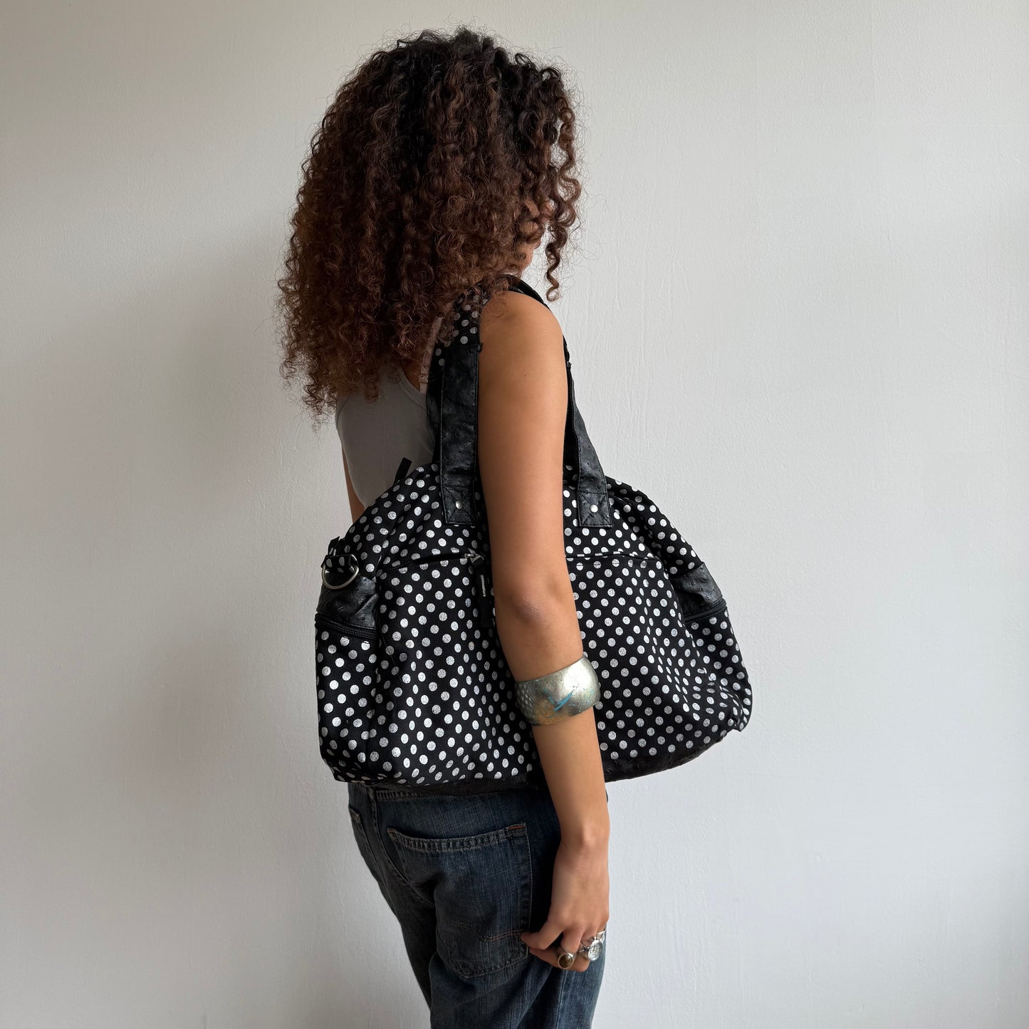 Black polka dot bowling bag