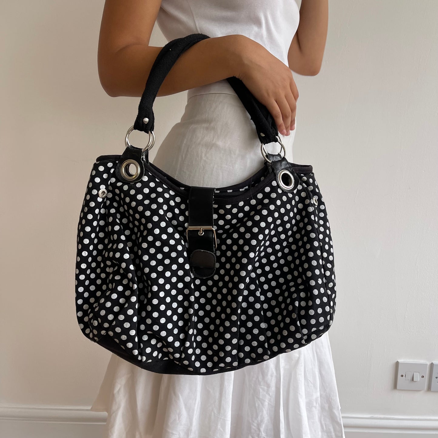 Black polka dot bag