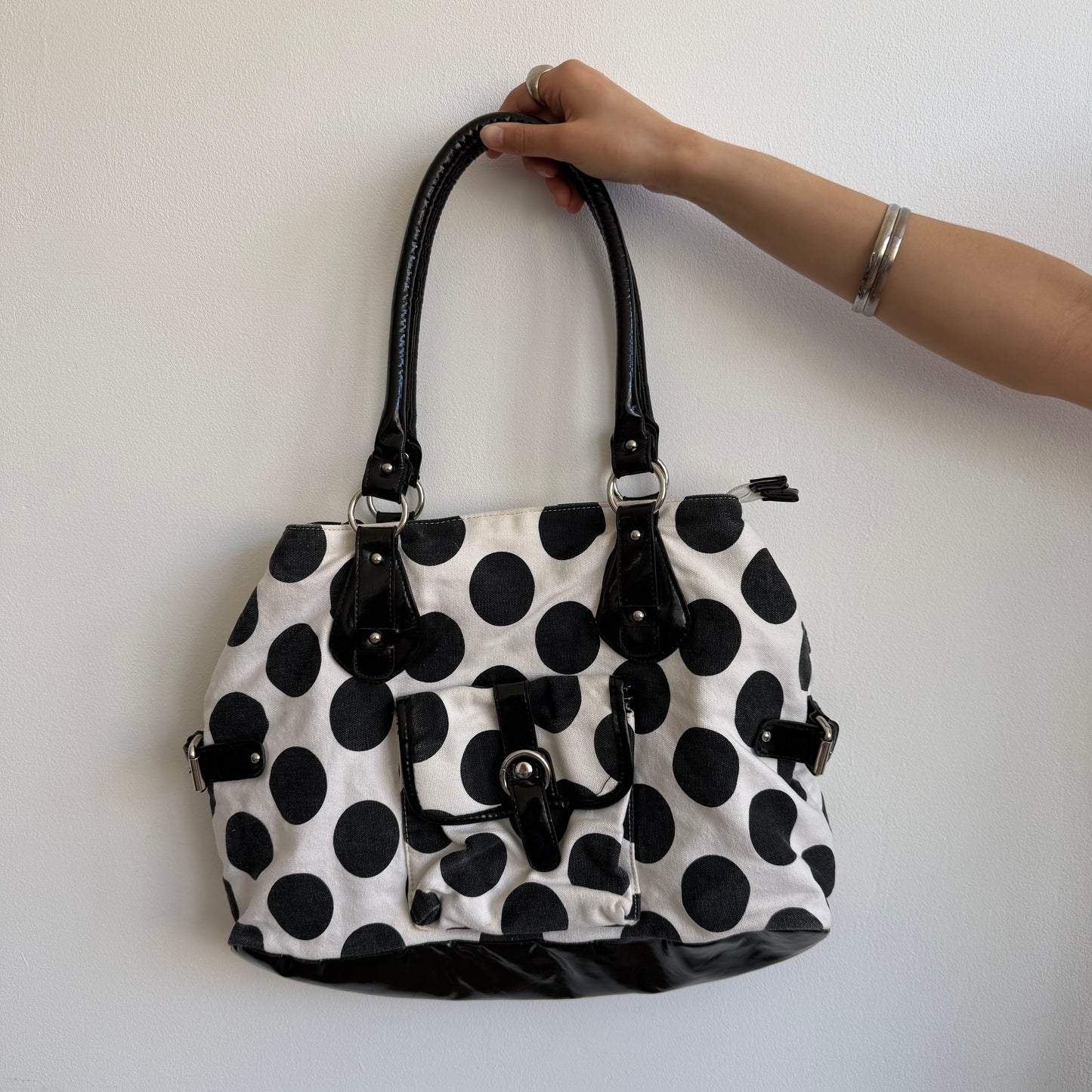 White polka dot bag