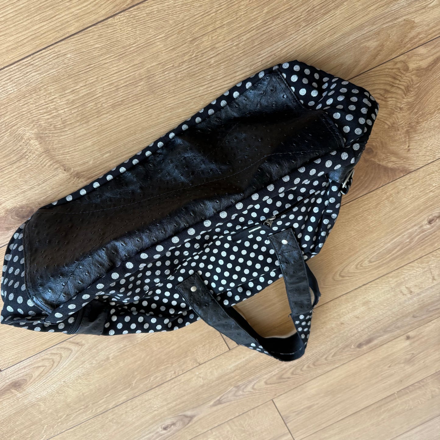 Black polka dot bowling bag