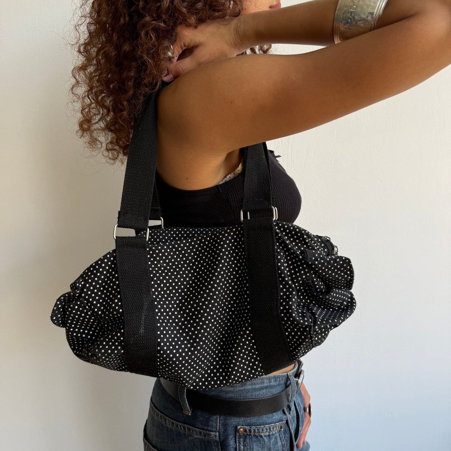 Black polka dot bowling bag