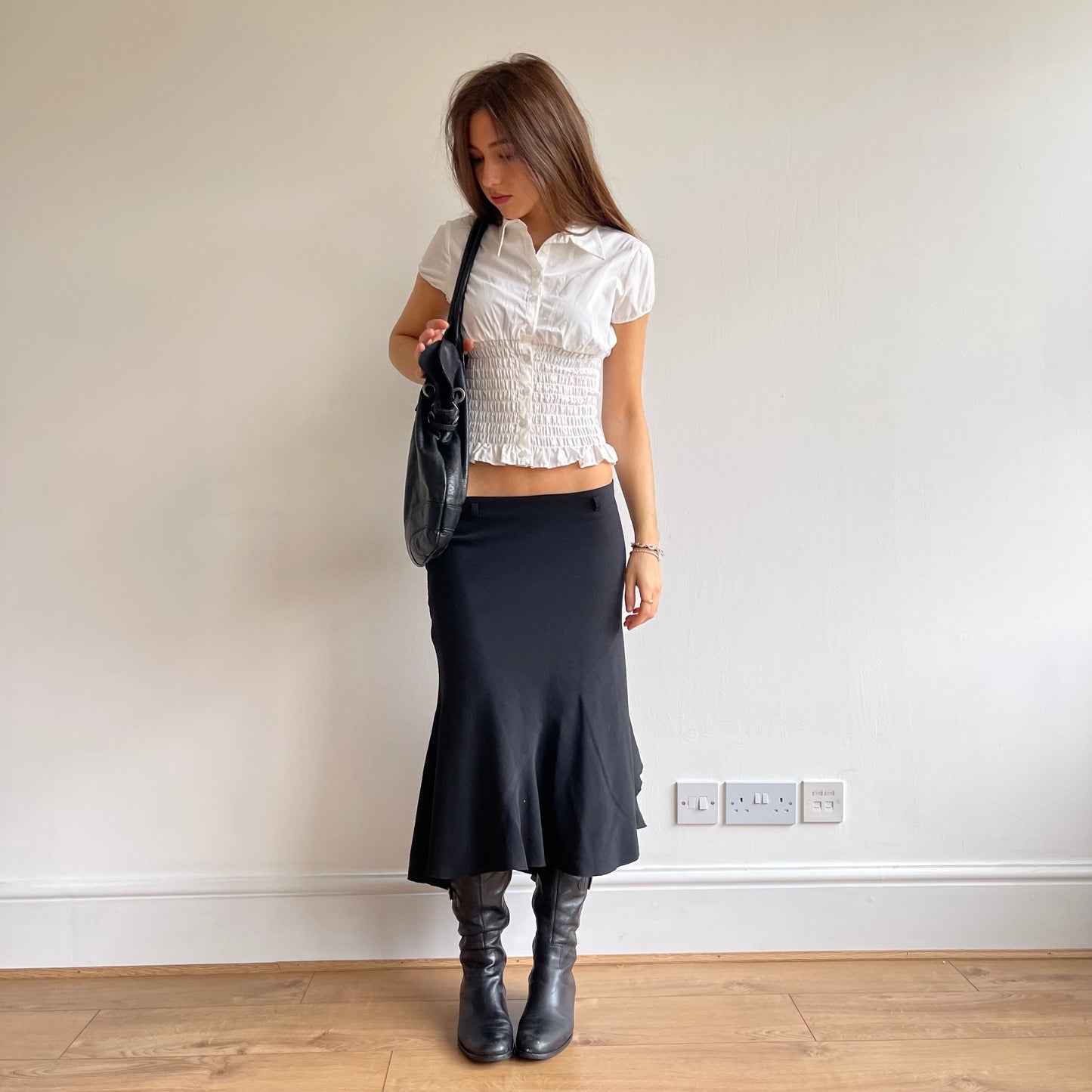 Black grommet slouchy bag