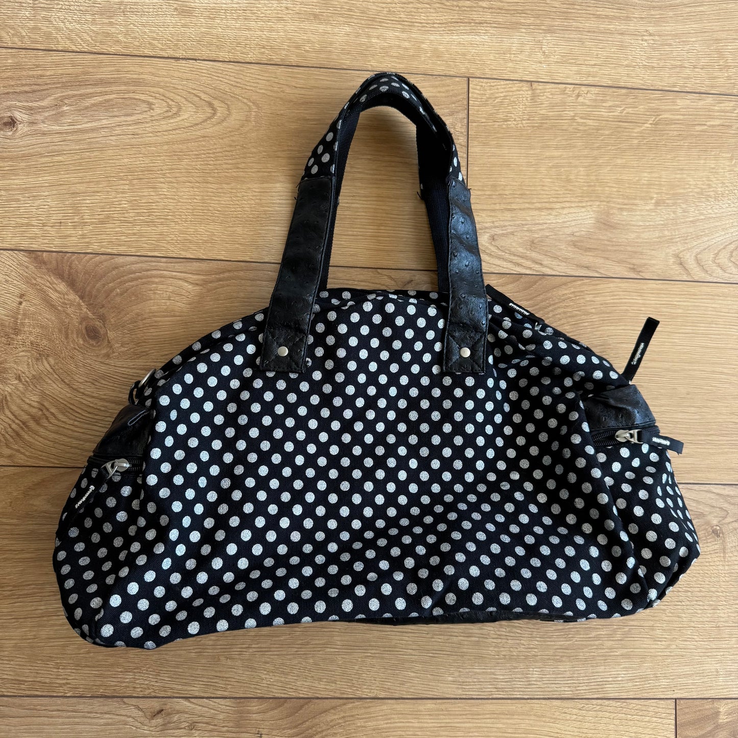 Black polka dot bowling bag