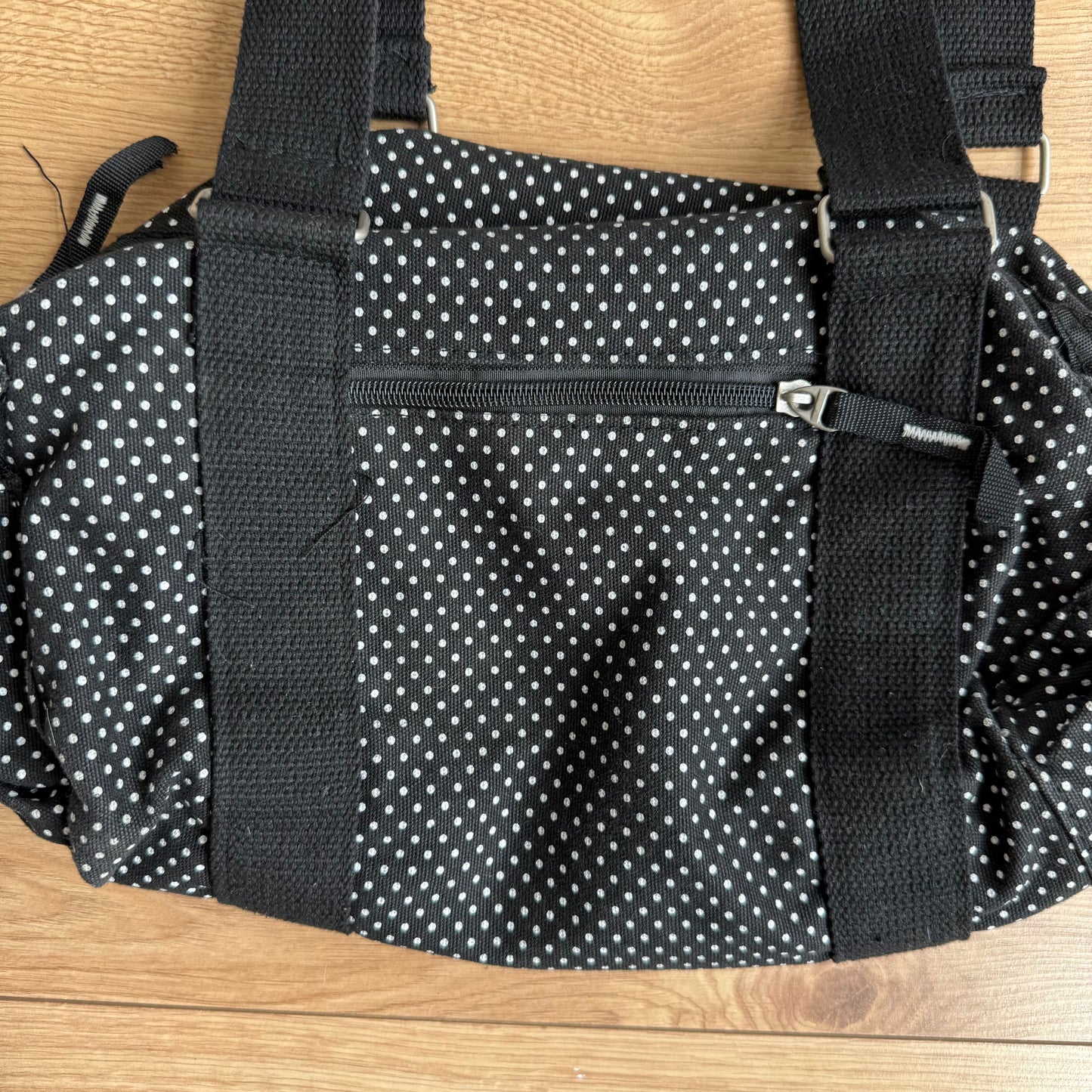 Black polka dot bowling bag