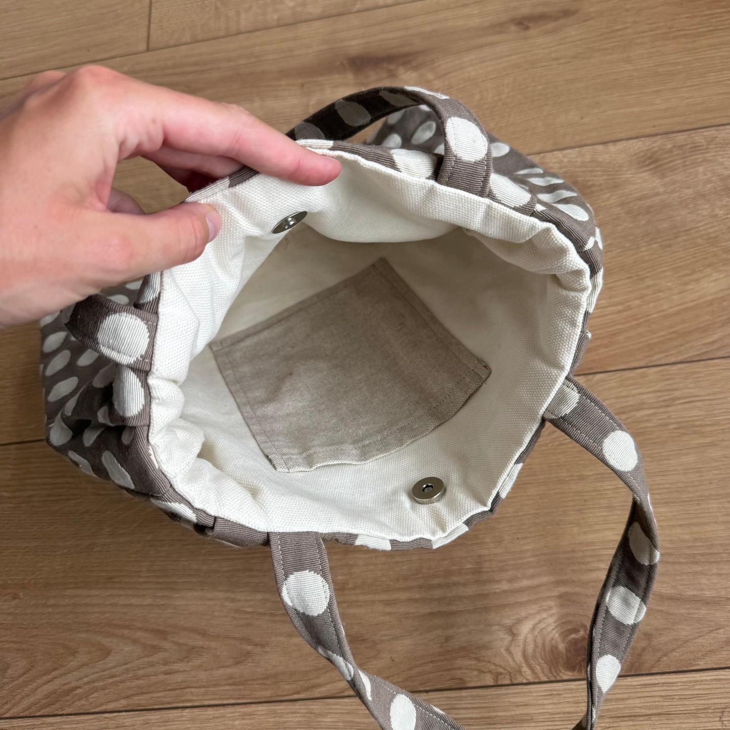 Taupe polka dot bag