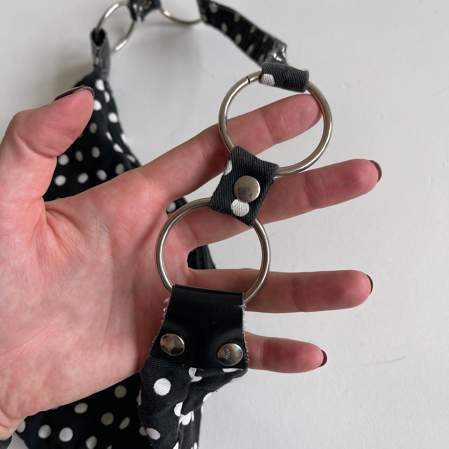 Black polka dot mini bag