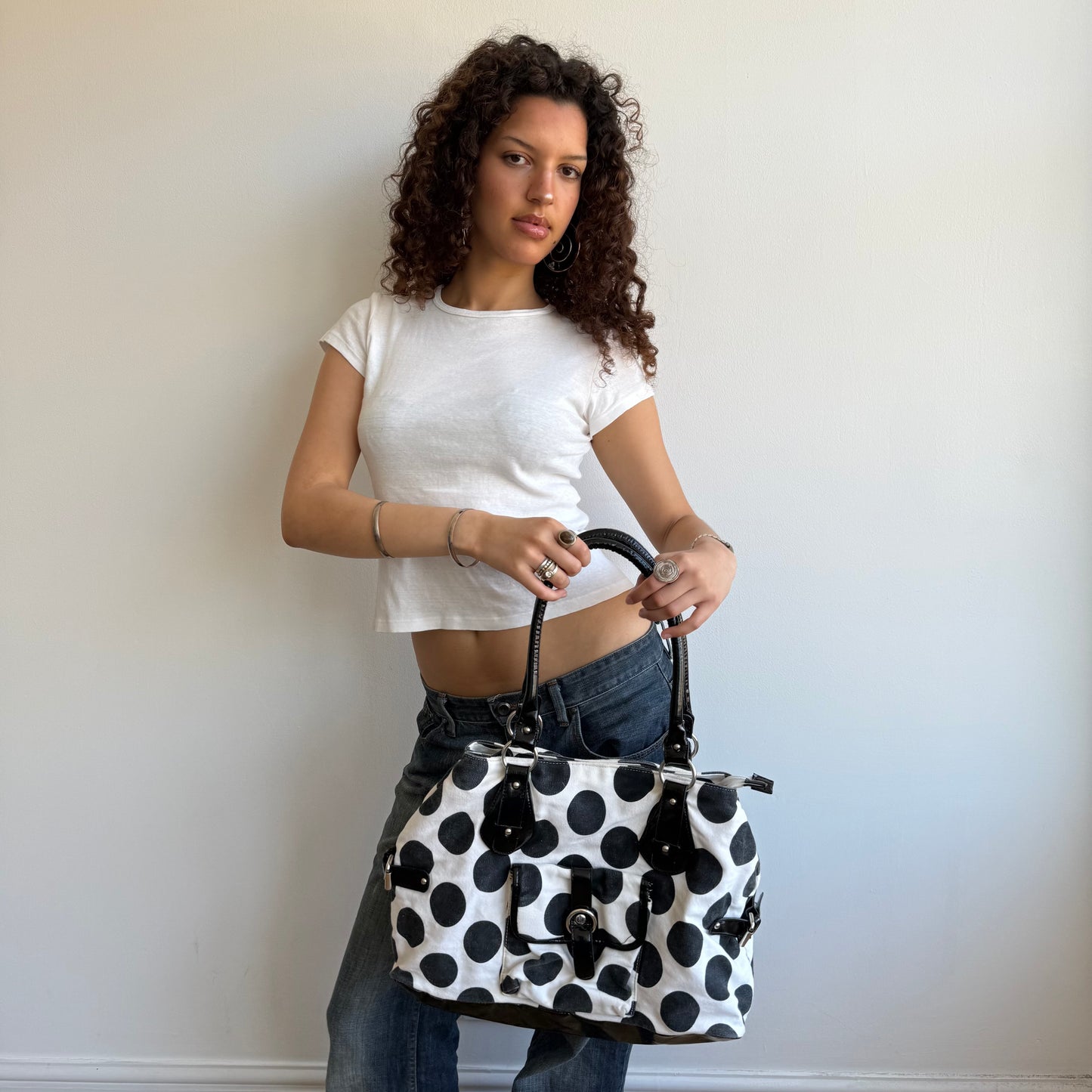 White polka dot bag