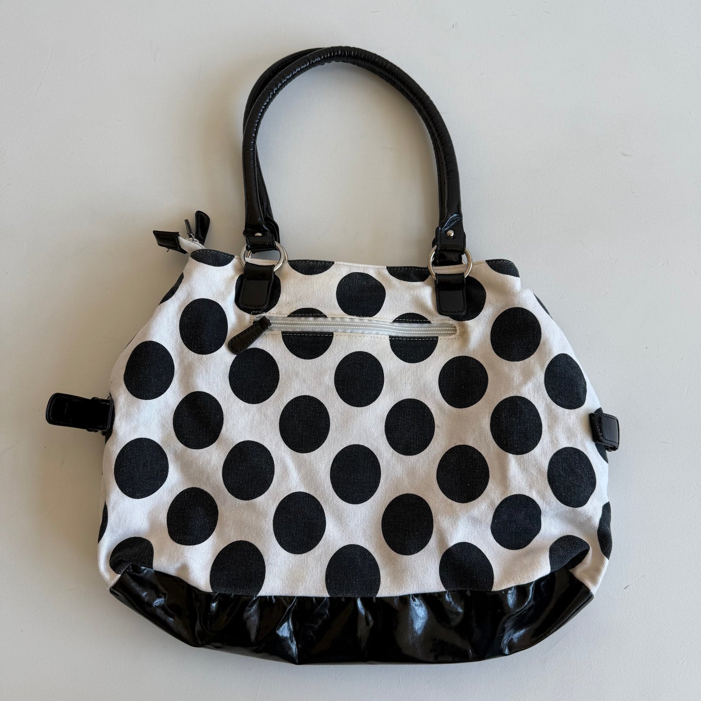 White polka dot bag