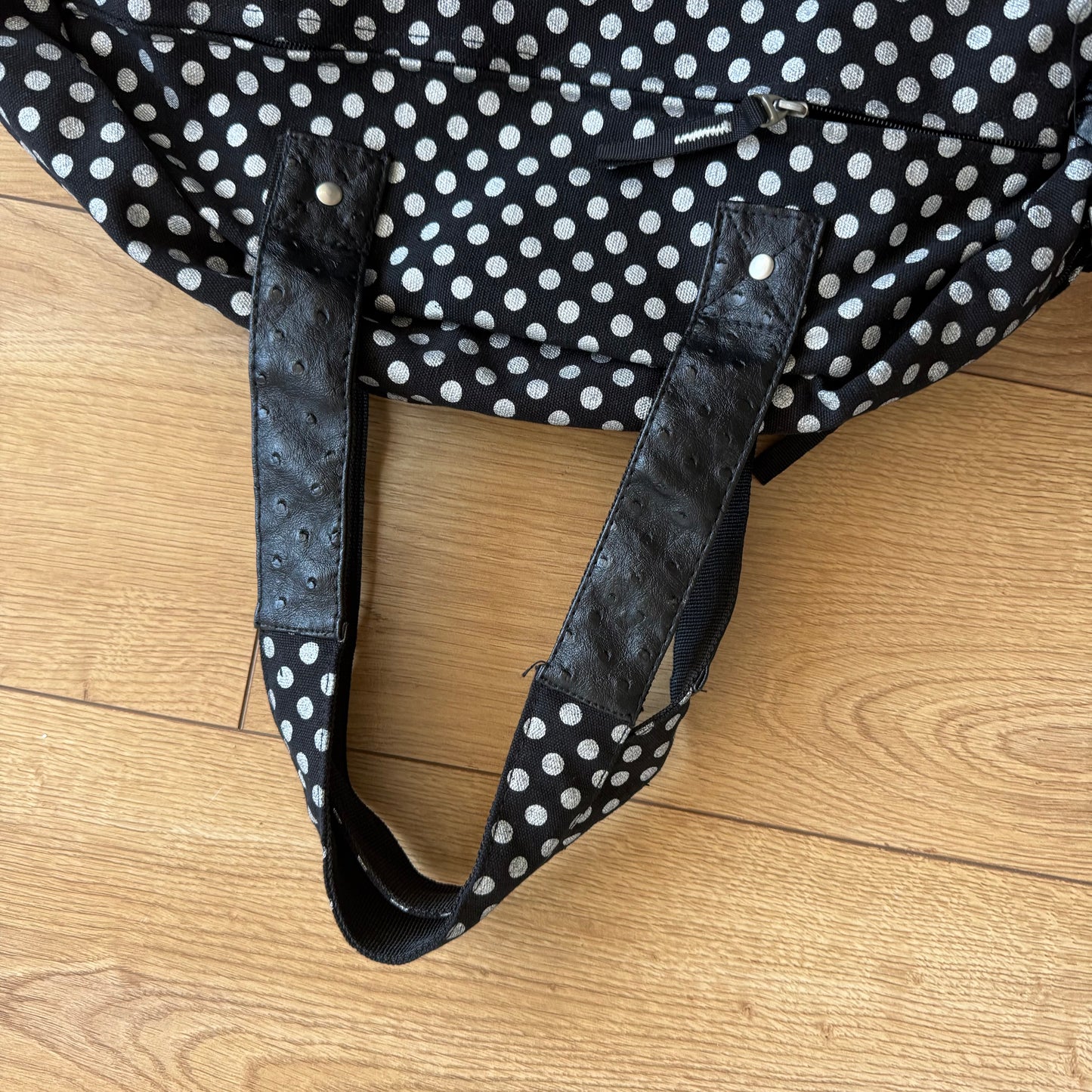Black polka dot bowling bag