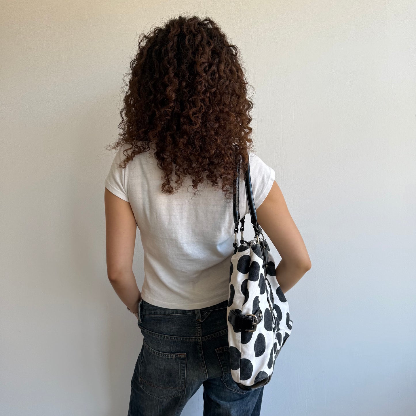 White polka dot bag