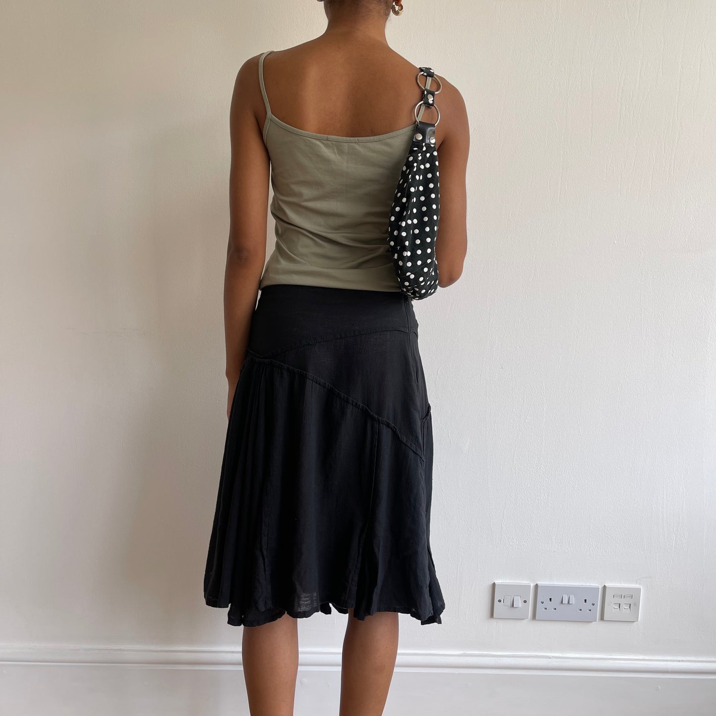 Black polka dot mini bag
