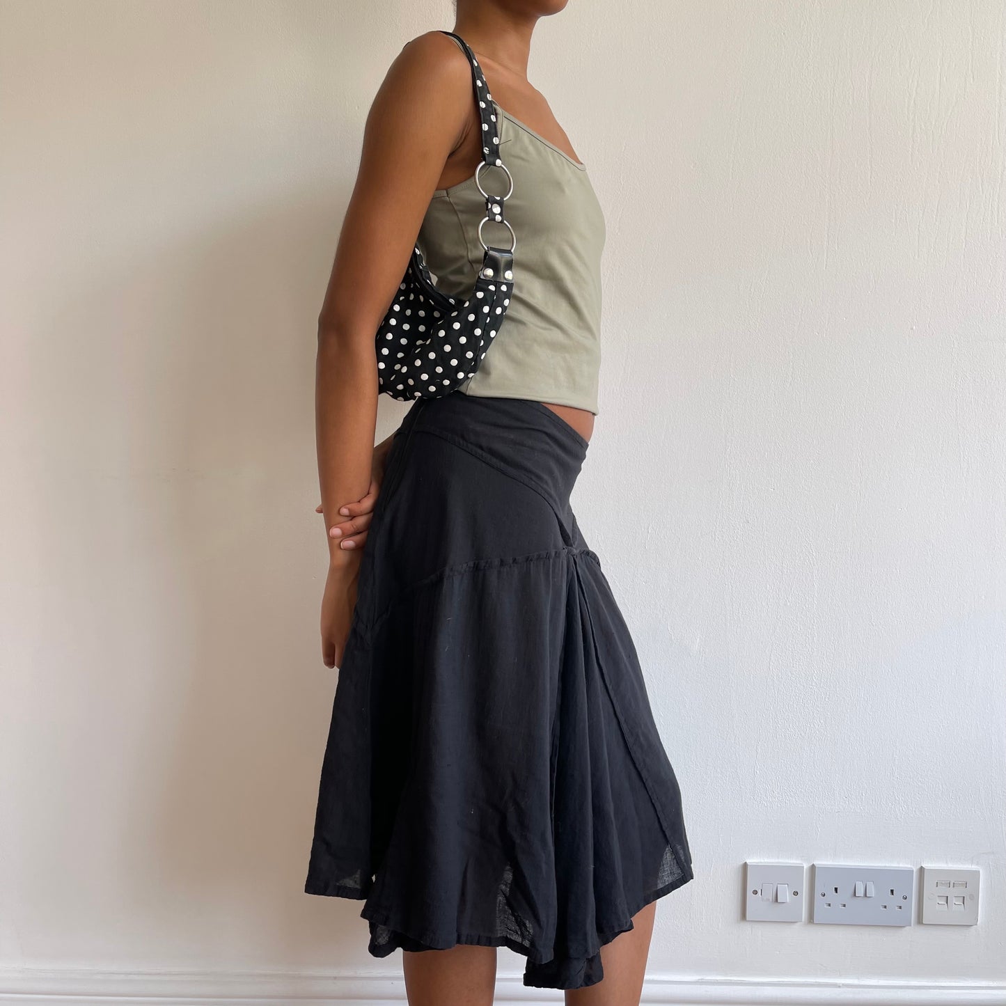 Black polka dot mini bag