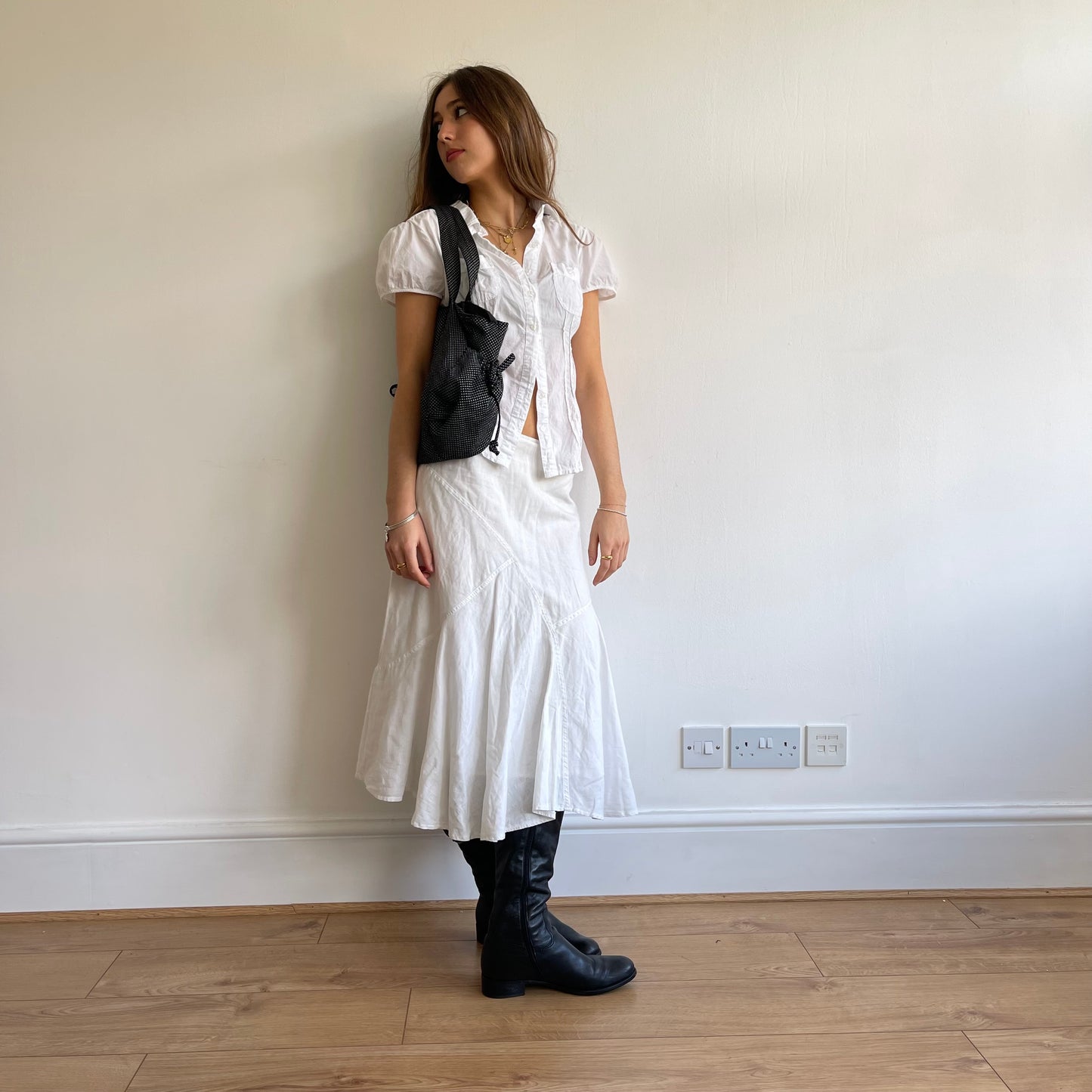 Black drawstring polka dot bag