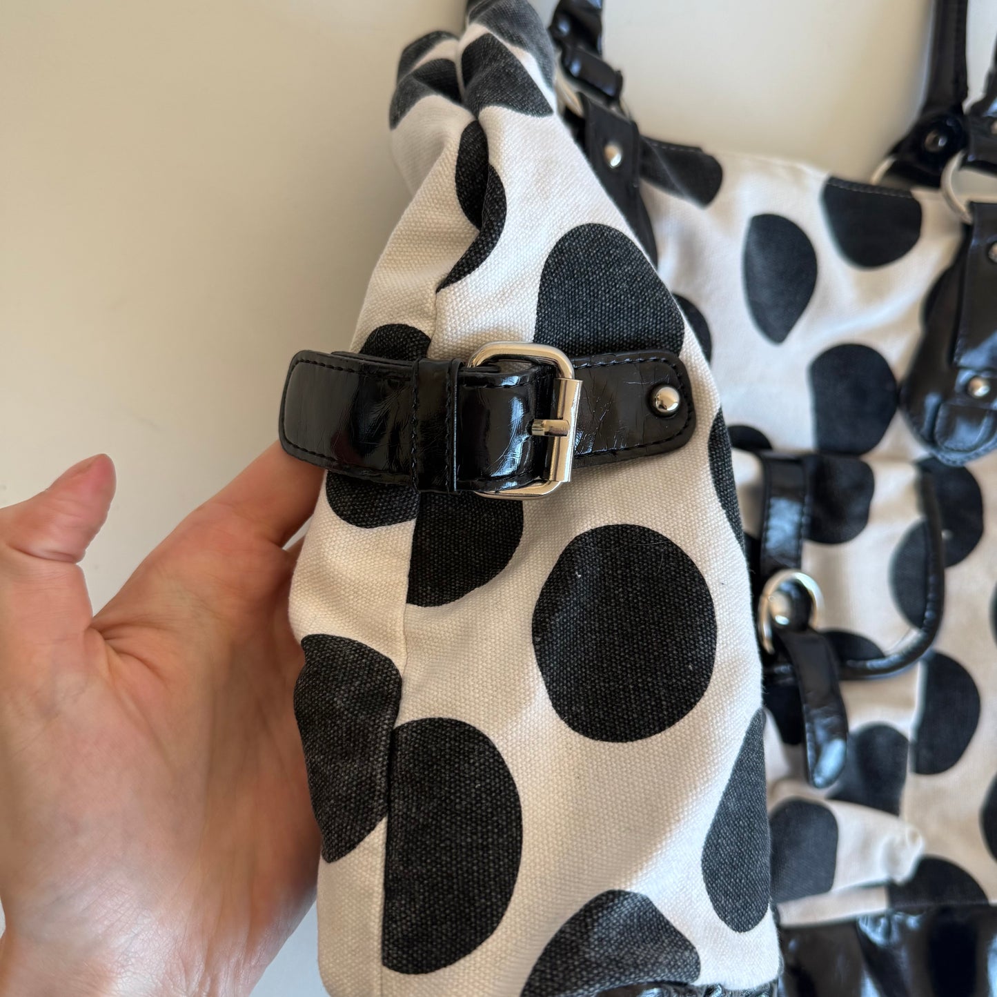 White polka dot bag