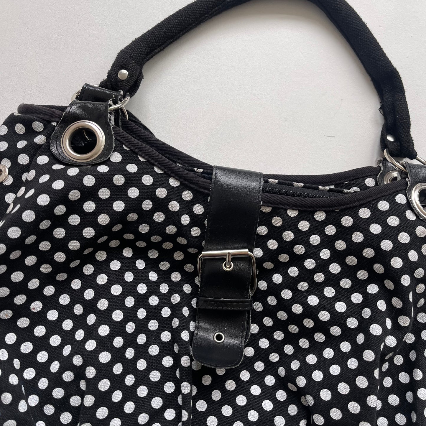 Black polka dot bag