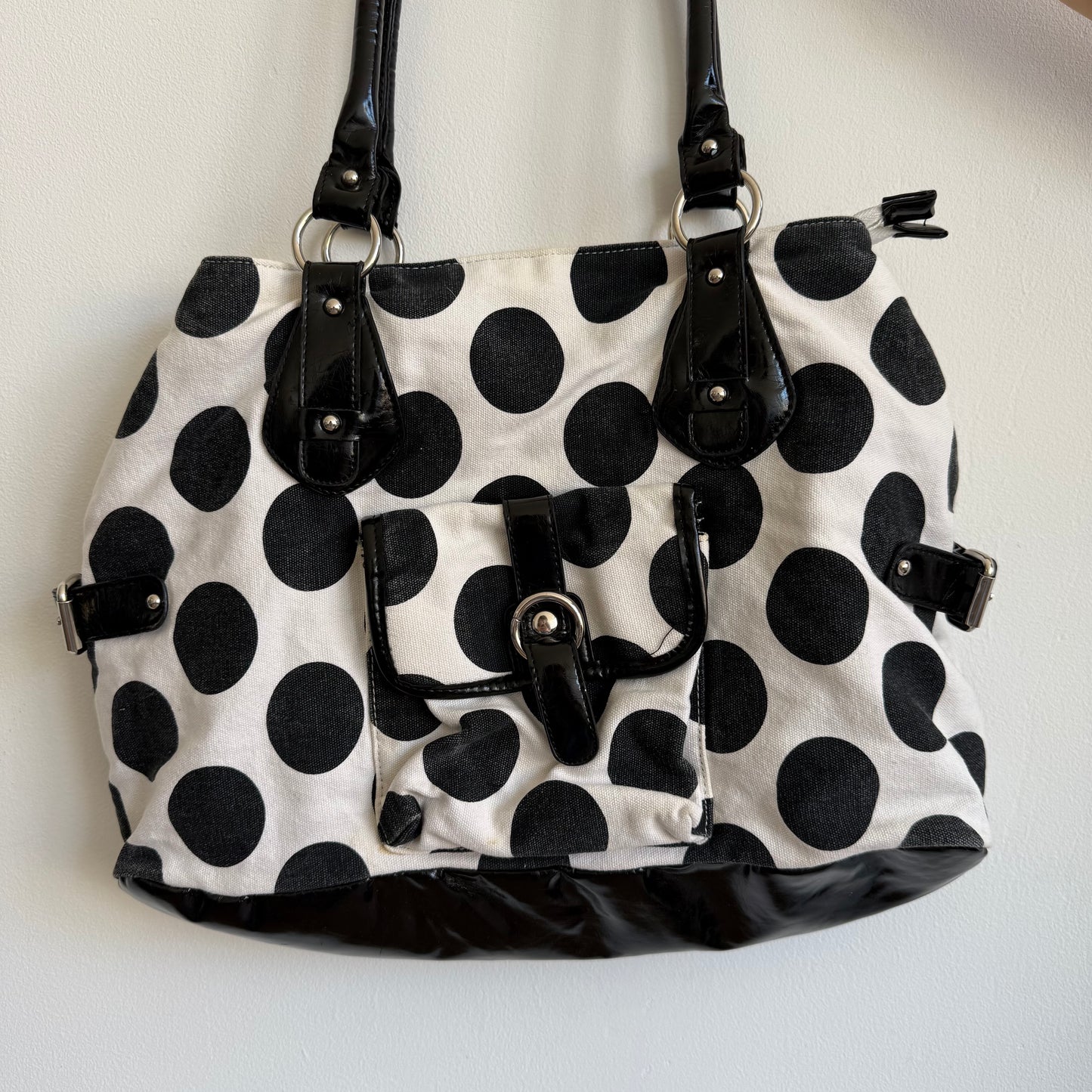 White polka dot bag