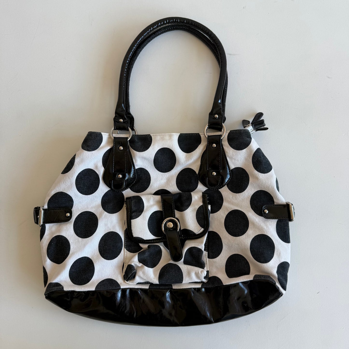 White polka dot bag