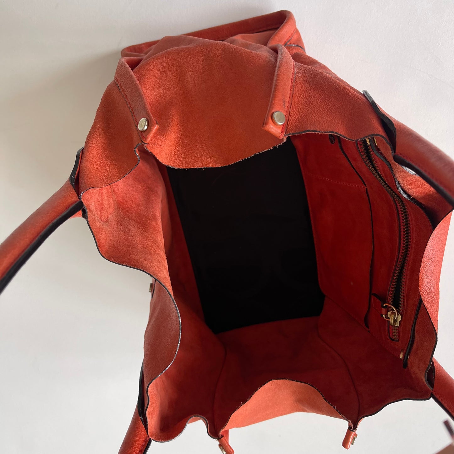 Orange leather slouchy bag