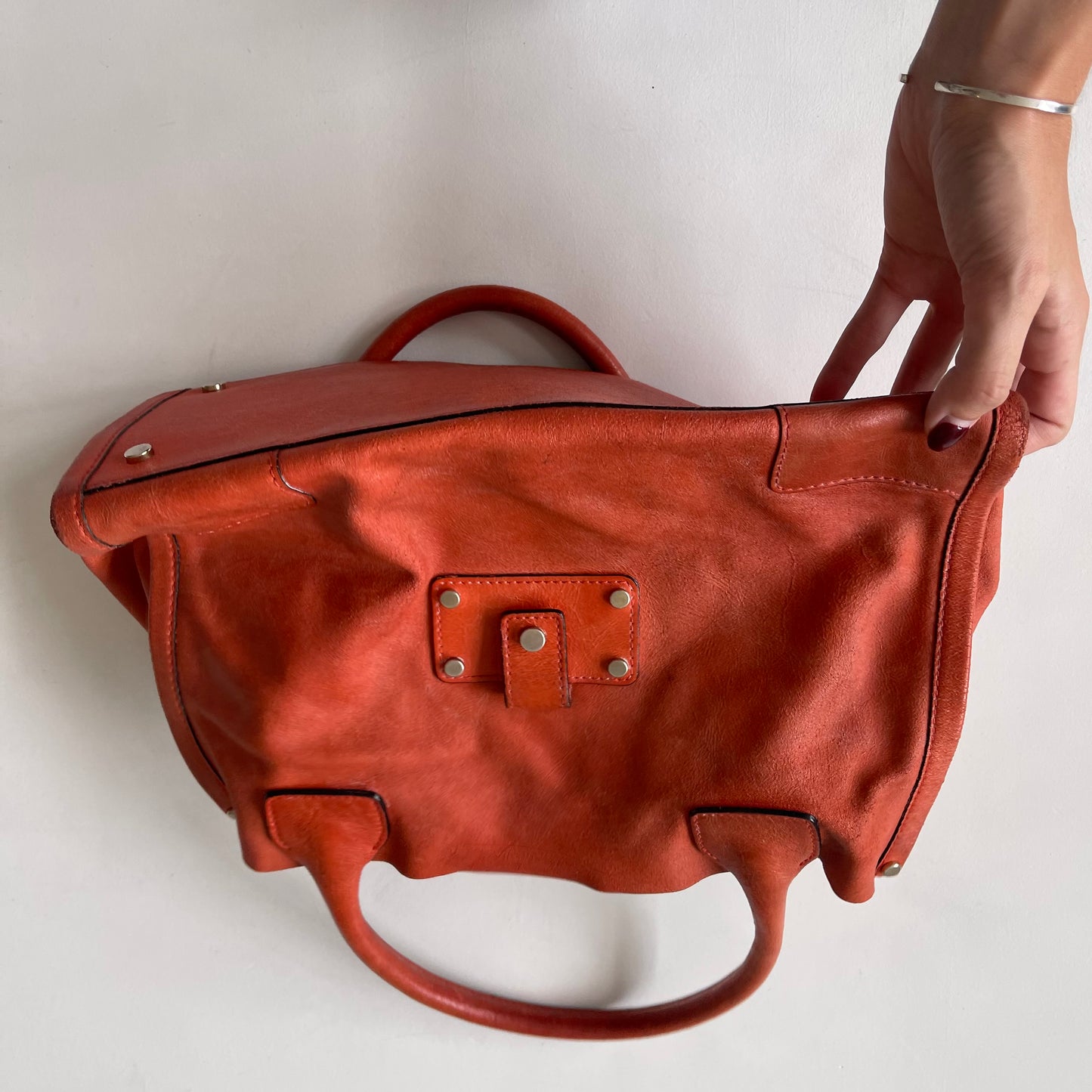 Orange leather slouchy bag