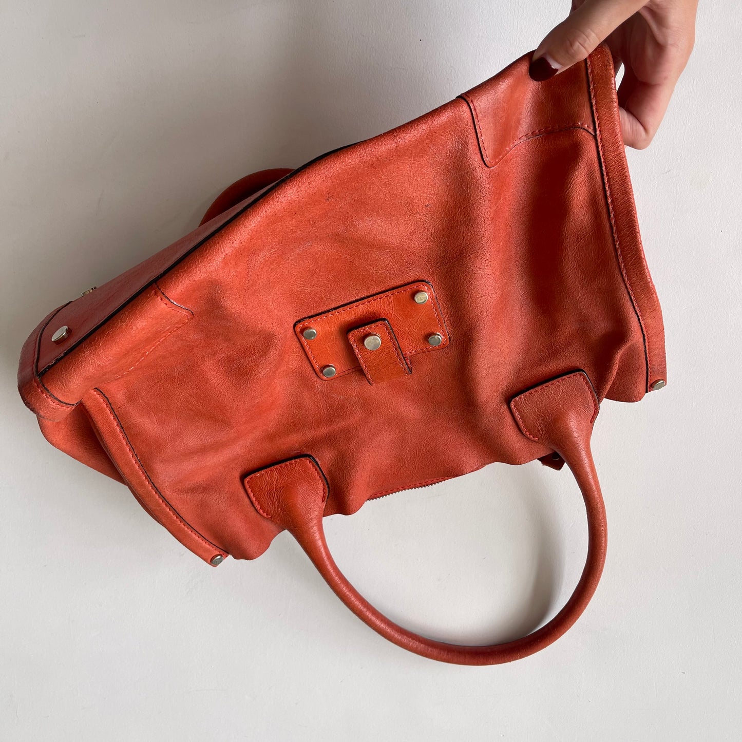 Orange leather slouchy bag