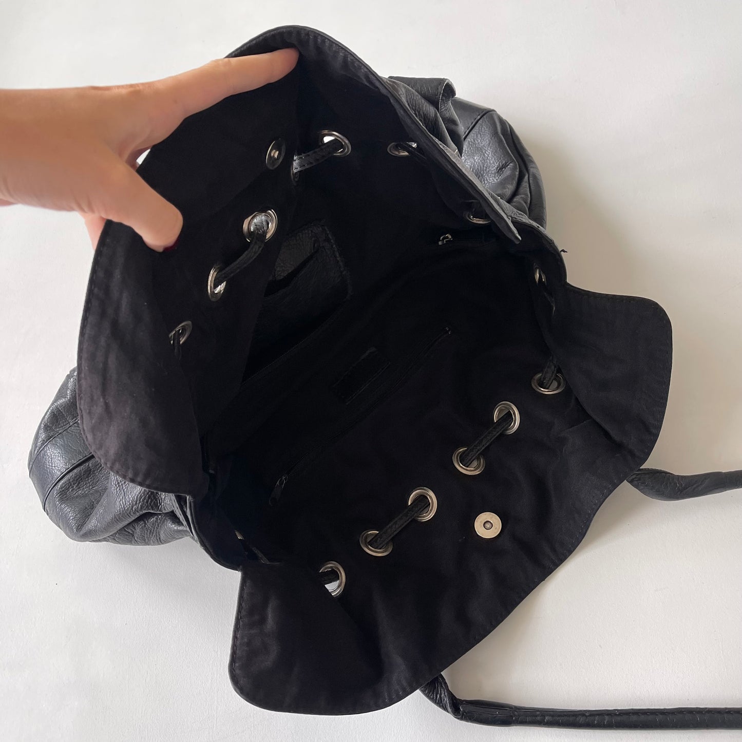 Black grommet slouchy bag