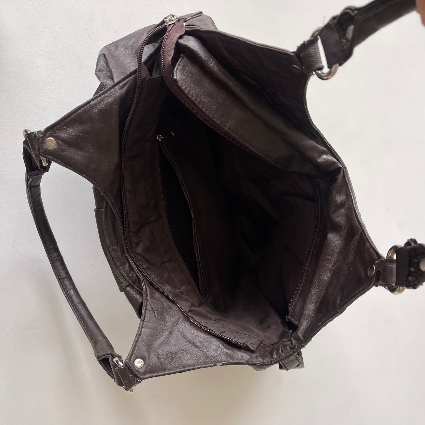 Brown studded slouchy bag