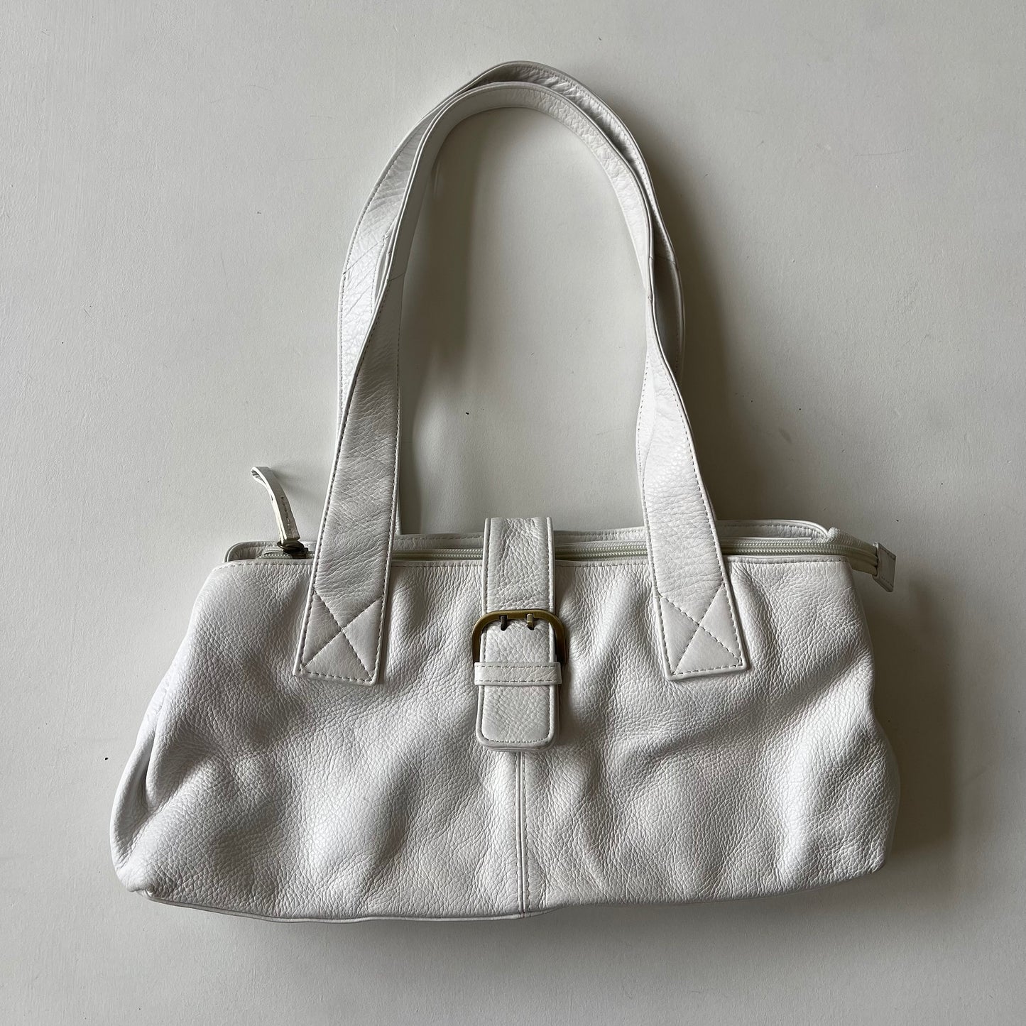 White leather buckle bag
