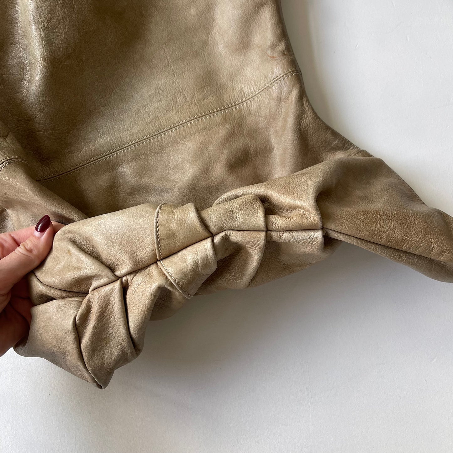 Beige slouchy leather bag