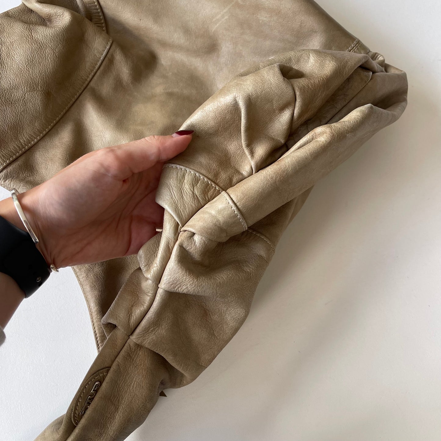 Beige slouchy leather bag