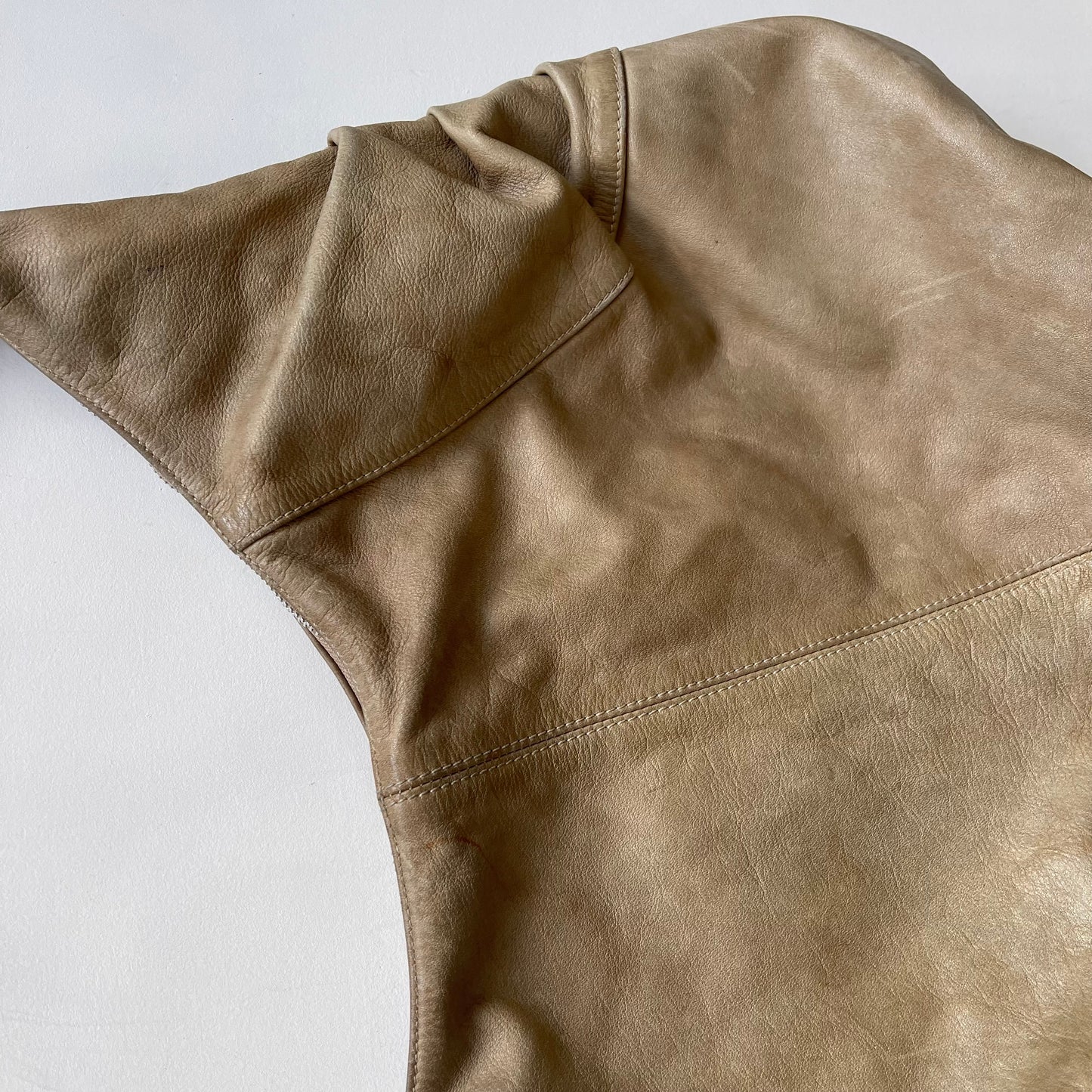 Beige slouchy leather bag