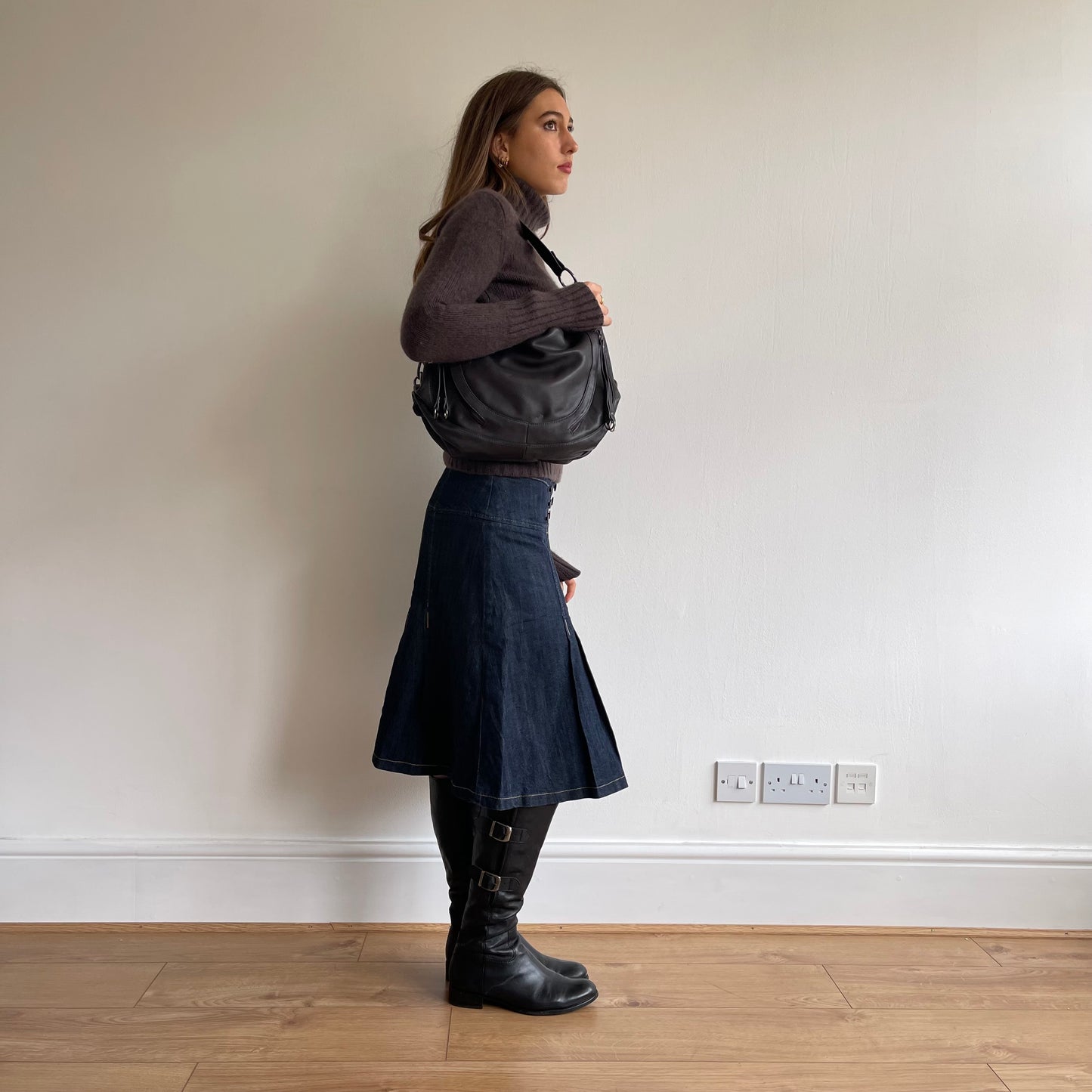 Brown leather crescent bag
