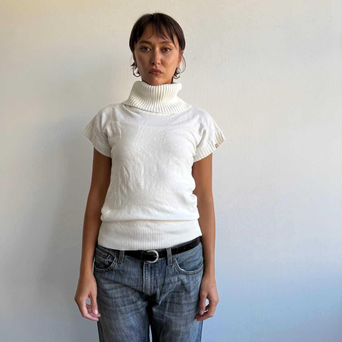 Cream short sleeve roll neck slouchy knit - Size M